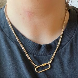 Gold chain carabiner necklace.